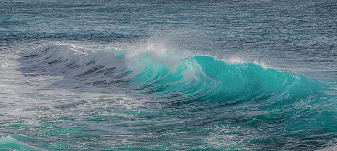 photography of body of water wave thumbnail