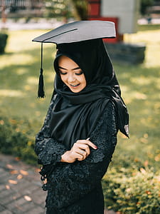 Selective Focus Photography of Woman Wearing Square Academic Cap thumbnail