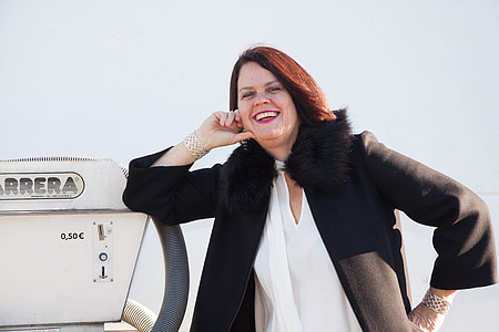 woman wearing black faux fur coat thumbnail