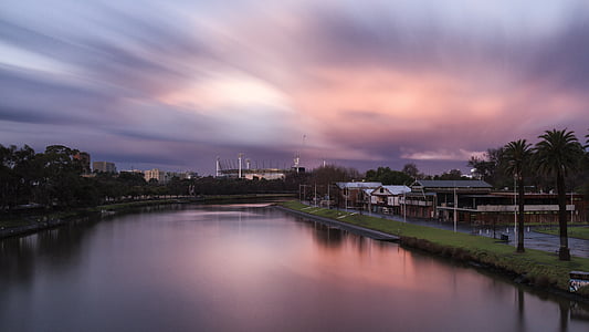 landscape photography of houses near body of water thumbnail