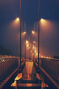 empty concrete bridge at night time thumbnail