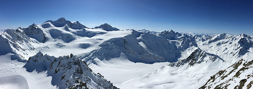 landscape photography of snowy mountain during daytime thumbnail