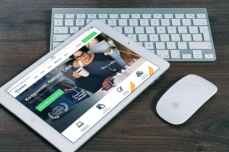 white iPad, white Apple magic mouse and wireless keyboard thumbnail
