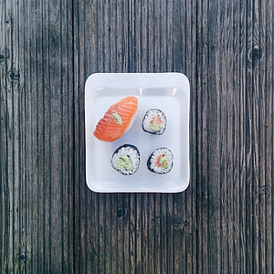 Minimal sushi on wooden background thumbnail