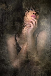 woman in black brassiere painting thumbnail