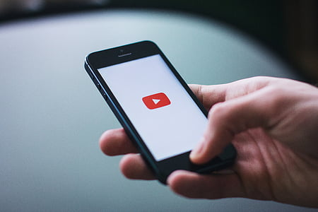 black smartphone showing youtube application thumbnail