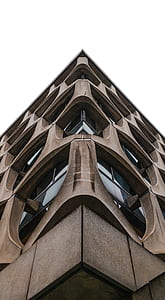 low-angle photography of brown concrete building thumbnail