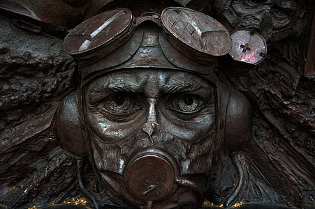 person wearing aviation helmet sculpture thumbnail