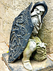 gray and blue ceramic male statue thumbnail