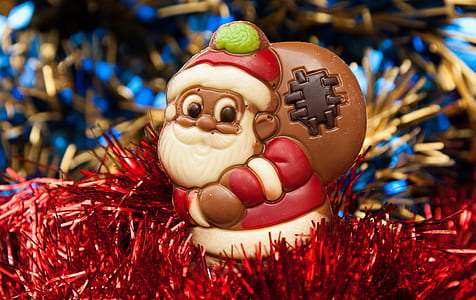 Santa Claus figurine on red pompom thumbnail
