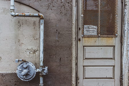 closed white wooden door thumbnail