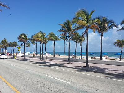people walking near road in resort thumbnail