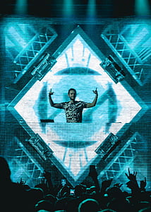 man performing on stage thumbnail
