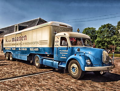 blue and white transport truck thumbnail