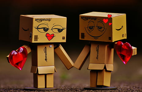 two Amazon box robots holding hands thumbnail