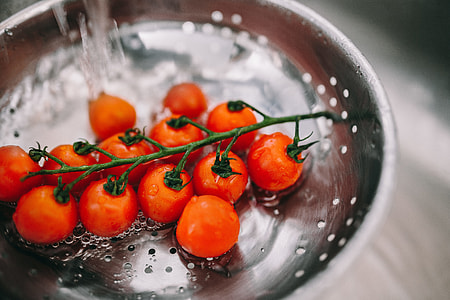 Washing vegetables in colander thumbnail
