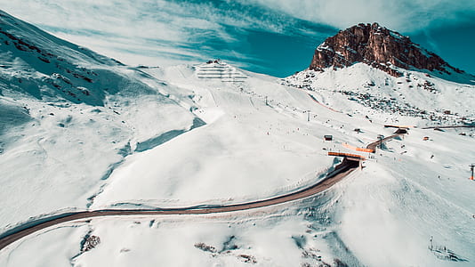 snowy mountain with zigzag road thumbnail