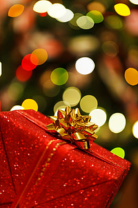 selective focus photography of red gift box thumbnail