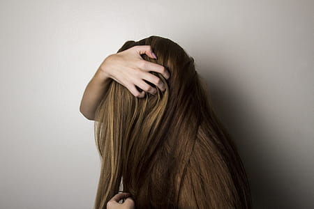 Photo of Woman Covering Face with Her Hair. thumbnail