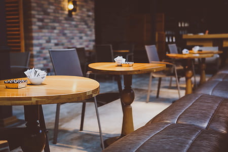 selective focus photo of brown table beside sofa thumbnail