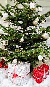 gift boxes under Christmas tree with baubles thumbnail
