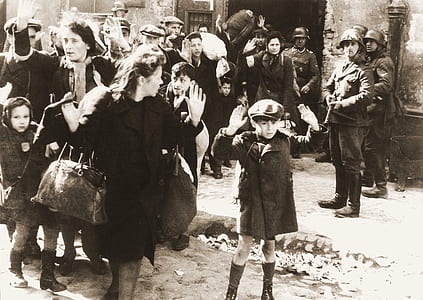 group of people standing while raising hands thumbnail