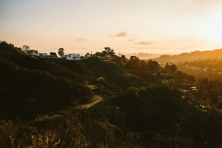 photo of mountain near houses thumbnail