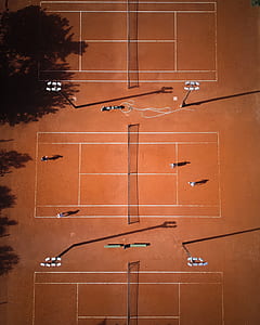 bird's eye photography of tennis field thumbnail