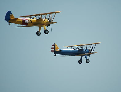 two yellow and blue bi planes thumbnail