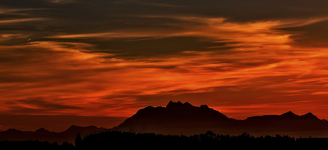 silhouette photography of mountain thumbnail