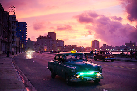 picture of taxi during night time thumbnail