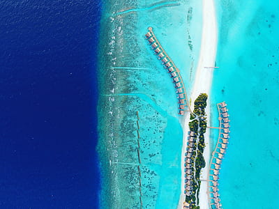 aerial photo of Maldives island with house thumbnail