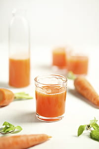 clear rock glasses near carrot thumbnail