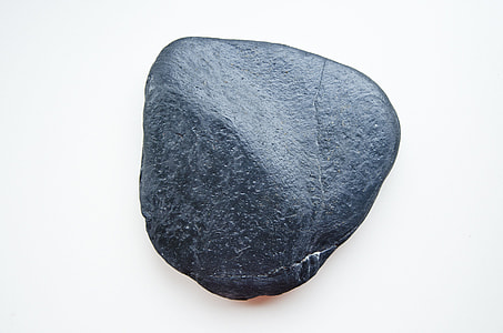 photography of a black stone with white background thumbnail