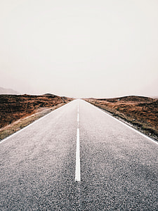 asphalt road during daytime thumbnail