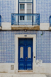 Colorful wooden door in the facade of a typical Portuguese house at Lisbon, Portugal thumbnail