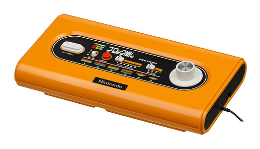 close-up photography of rectangular orange and black Nintendo electronic device thumbnail