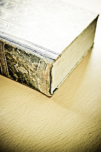 close-up photo of book on brown surface thumbnail