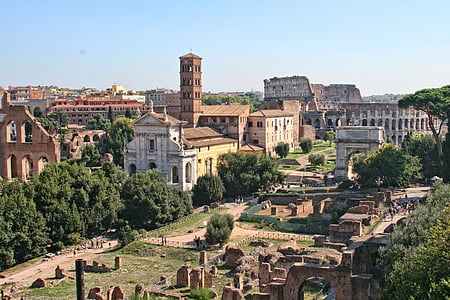 aerial view of brown and white concrete buildings during daytime thumbnail