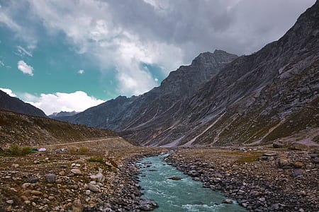 rocky mountain near the river photography thumbnail