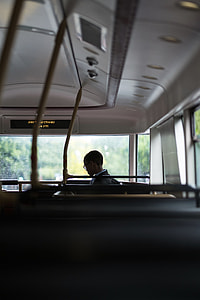 boy sitting on front og vehicle thumbnail