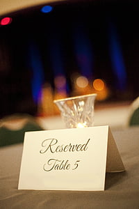 Reserved table 5 paper near glass cup thumbnail