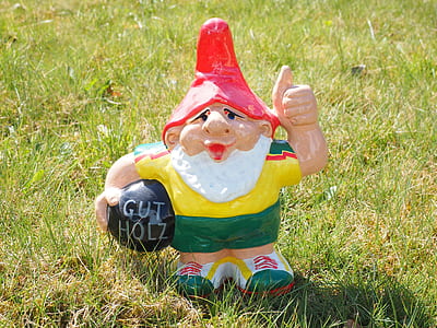 dwarf figurine on grass thumbnail