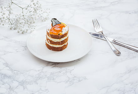 plate of souffle beside fork and knife thumbnail