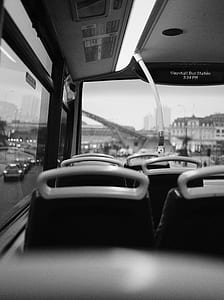 grayscale photo of bus interior thumbnail