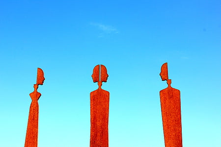 three red human statues thumbnail