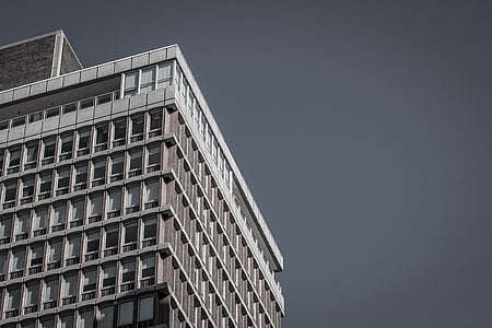 low-angle photography of gray building thumbnail