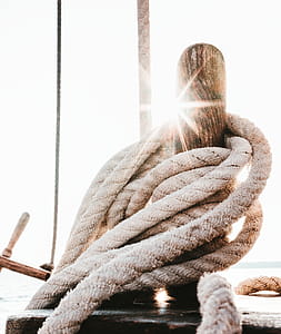 Brown Wooden Stick Surrounded by Rope thumbnail