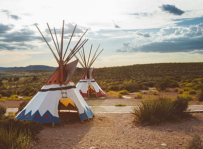 two white tipi tents thumbnail