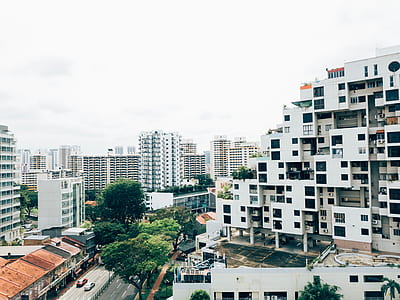 white concrete building at daytime thumbnail